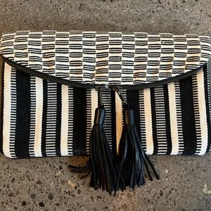 Black and white woven clutch